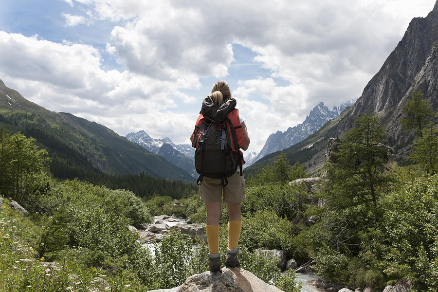 Woman Hiking In A Pristine Valley #2 Photograph by Buena Vista Images