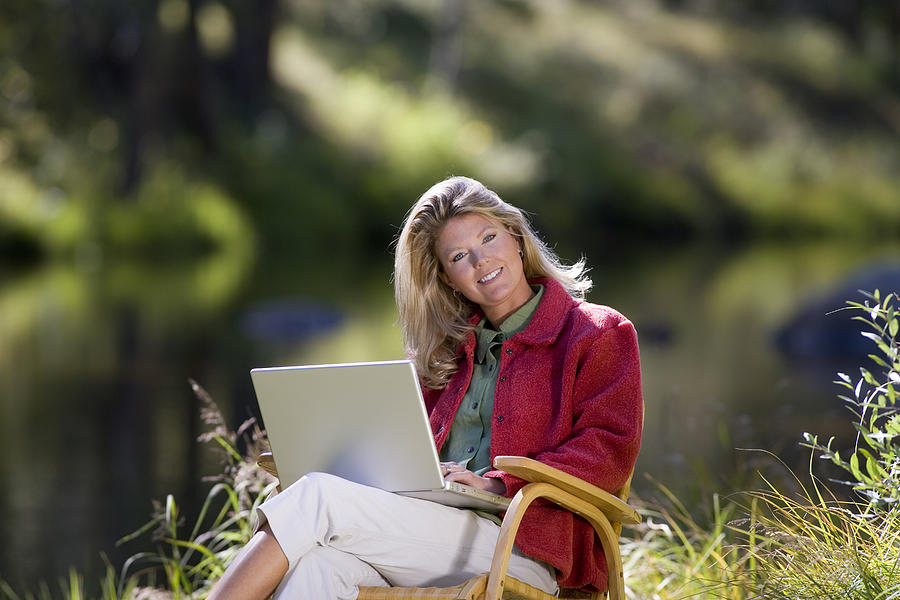 Woman with laptop #2 Photograph by Comstock Images