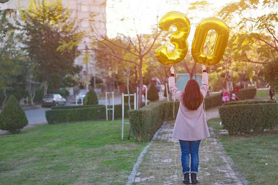 Young woman celebrates a thirty years birthday Photograph by Burak Karademir Young woman celebrates a thirty years birthday Photograph by Burak Karademir
