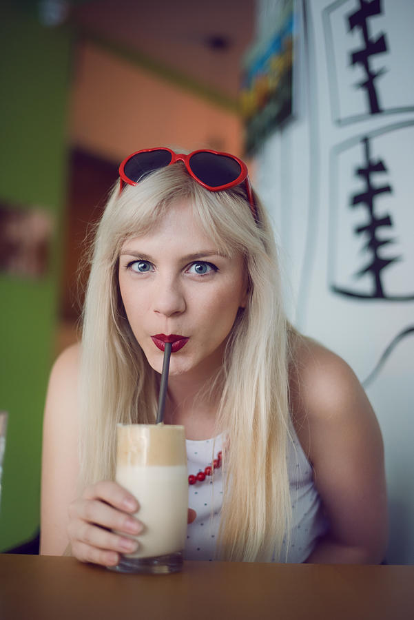 Young woman drinking coffee #2 Photograph by Emilija Manevska