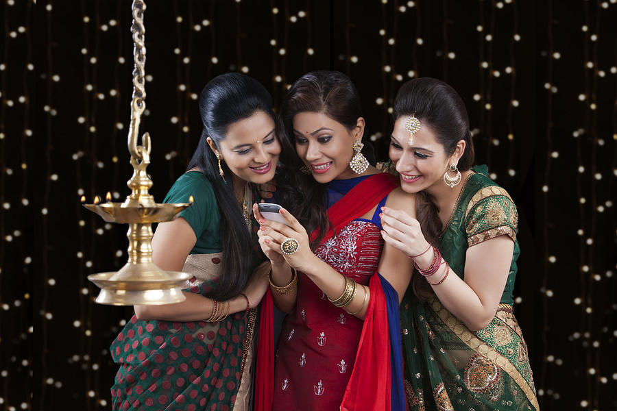 Young women celebrating Diwali #2 Photograph by Sudipta Halder