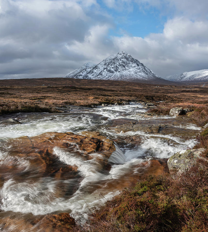 Majestic Winter landscape image of River Etive in foreground wit ...