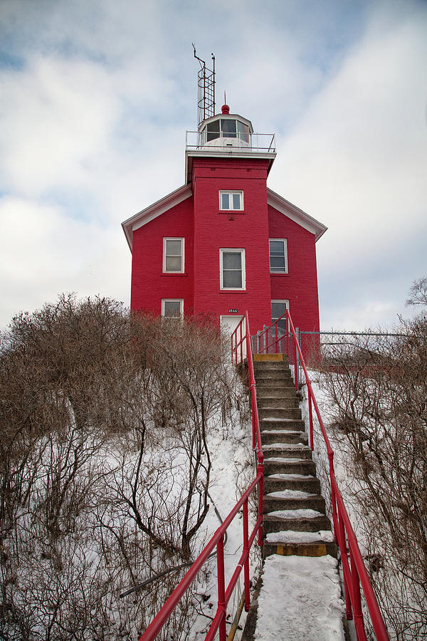 Marquette Harbor Lighthouse along Lake Superior in Marquette Michigan in the winter #21 Photograph by Eldon McGraw