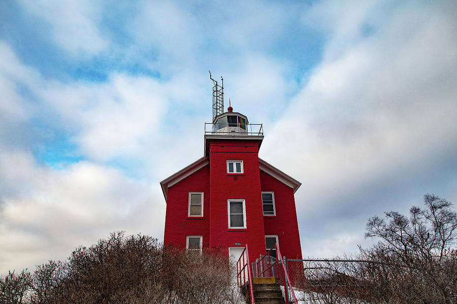 Marquette Harbor Lighthouse along Lake Superior in Marquette Michigan in the winter #22 Photograph by Eldon McGraw