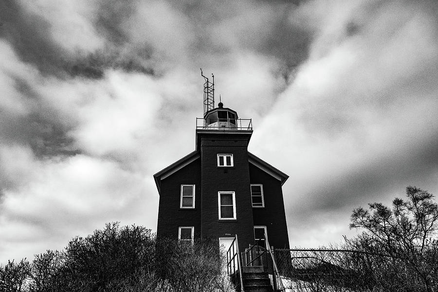 Marquette Harbor Lighthouse along Lake Superior in Marquette Michigan in the winter #23 Photograph by Eldon McGraw