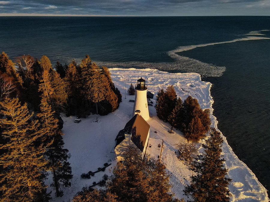 Old Presque Isle Lighthouse in Michigan along Lake Huron in the winter #24 Photograph by Eldon McGraw