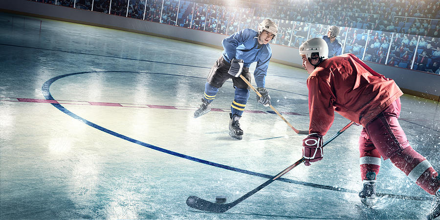 Ice hockey players in action #26 Photograph by Dmytro Aksonov