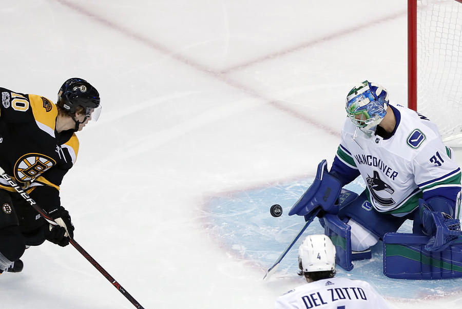 NHL: OCT 19 Canucks at Bruins #26 Photograph by Icon Sportswire