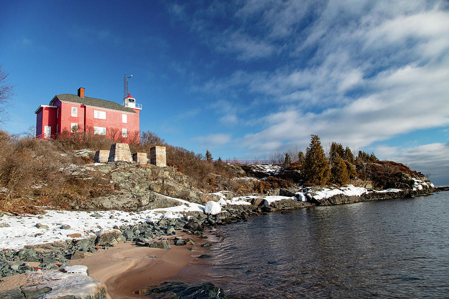Marquette Harbor Lighthouse along Lake Superior in Marquette Michigan in the winter #27 Photograph by Eldon McGraw