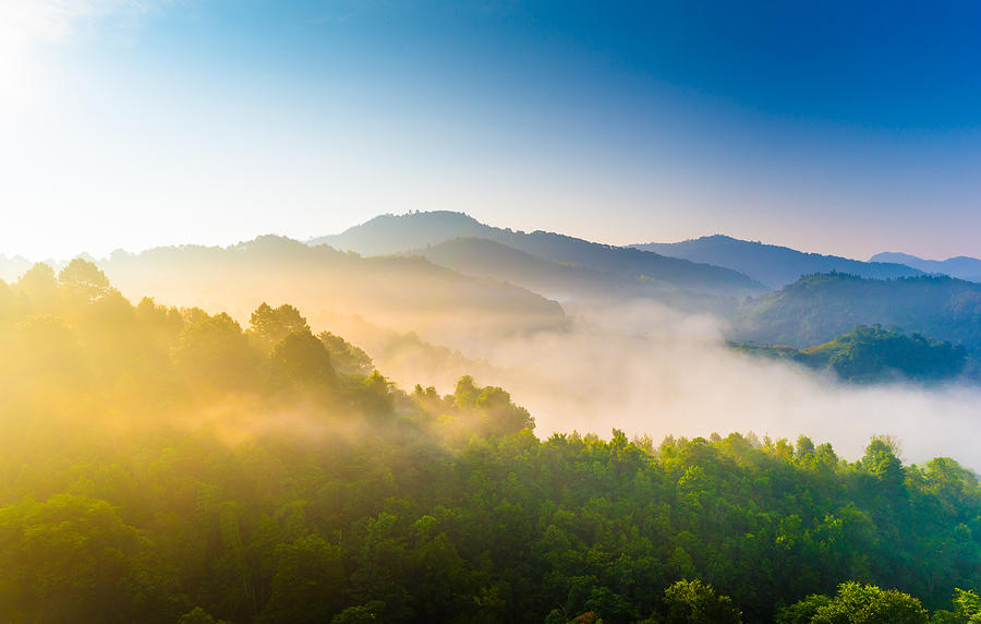 Beautiful sunshine at misty morning mountains . #3 Photograph by Primeimages