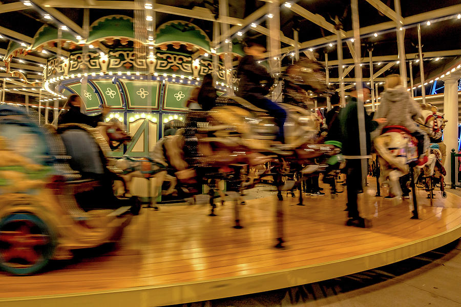 Blurred merry-go-round in Winter Wonderland #3 Photograph by Alex Grichenko