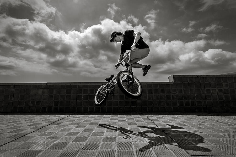 BMX rider jumping #3 Photograph by Aluxum