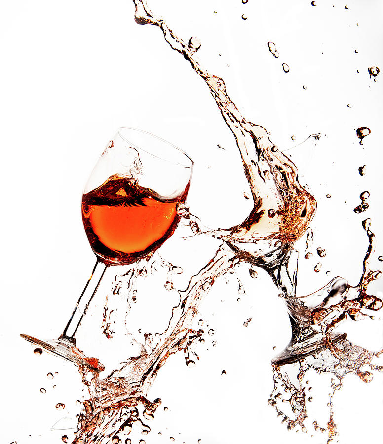Broken wine glasses with wine splashes on a white background Photograph by Michalakis Ppalis