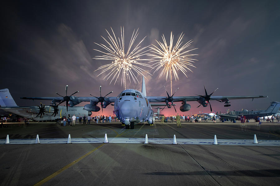 Airplane Photograph - C130 with fireworks #3 by Keith Homan