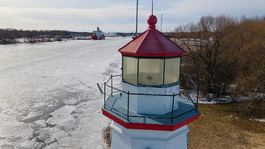 Cheboygan Lighthouse in Cheboygan Michigan in the winter #3 Photograph by Eldon McGraw