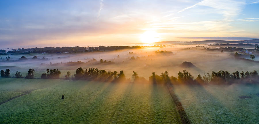 Colorfull sunrise on foggy day over Tipperary mountains and fields #3 Photograph by Mikroman6