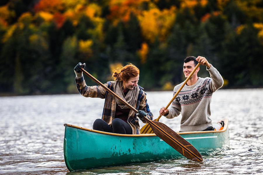Couple enjoying a ride on a typical canoe in Canada #3 Photograph by LeoPatrizi