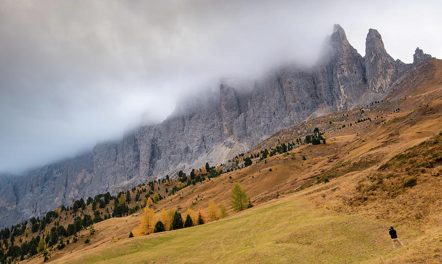 Dolomite mountain peaks covered in fog during sunrise  #4 Photograph by Michalakis Ppalis