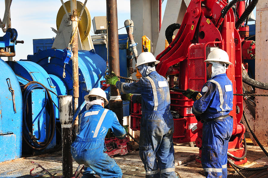 Drilling rig workers #3 Photograph by HHakim