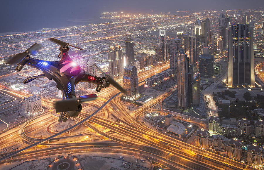 Drone flying over a futuristic city #3 Photograph by Buena Vista Images
