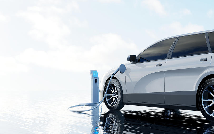 Electric Car Charging Photograph by 3alexd