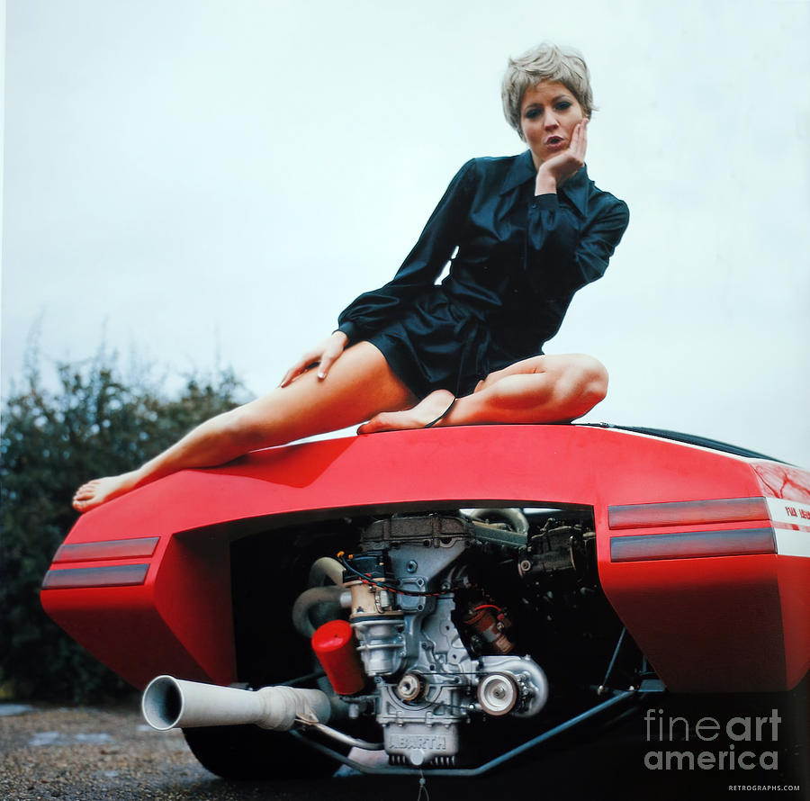 Fashion model in 1960s sports car #3 Photograph by Retrographs