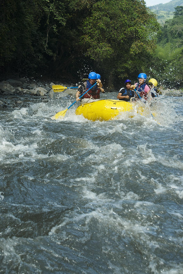 Five people rafting in a river #3 Photograph by Glowimages