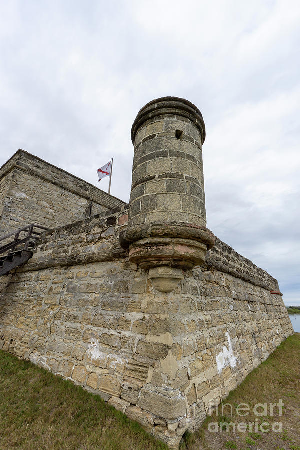 Garita, or sentry box, and Spanish flag at Fort Matanzas Nationa #3 Photograph by William Kuta