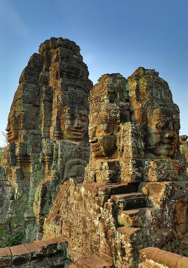 Giant stone faces at Bayon Temple in Cambodia #3 Photograph by Mikhail Kokhanchikov