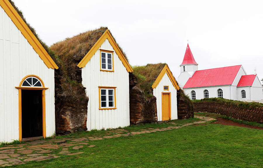 Glaumbaer turf farm house and approaching storm Skagafjordur in ...