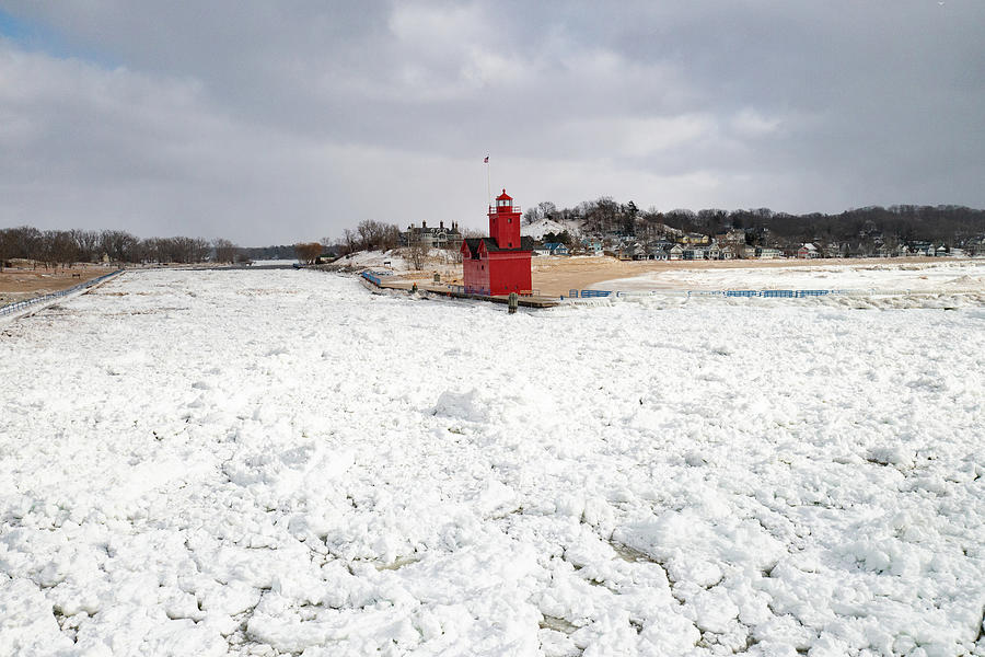Holland Michigan Lighthouse in the winter #3 Photograph by Eldon McGraw
