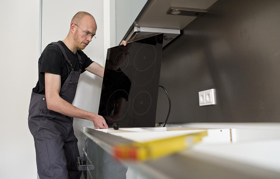 Installing A Fitted Kitchen #3 Photograph by Michael Gottschalk