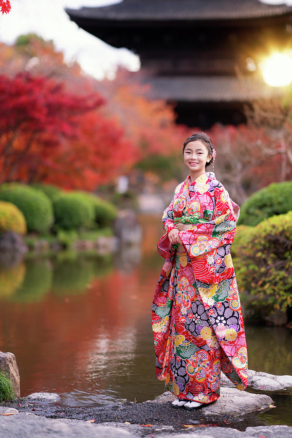 Japanese tourist girl in red Kimono traditional dress walking in #3 Photograph by Anek Suwannaphoom