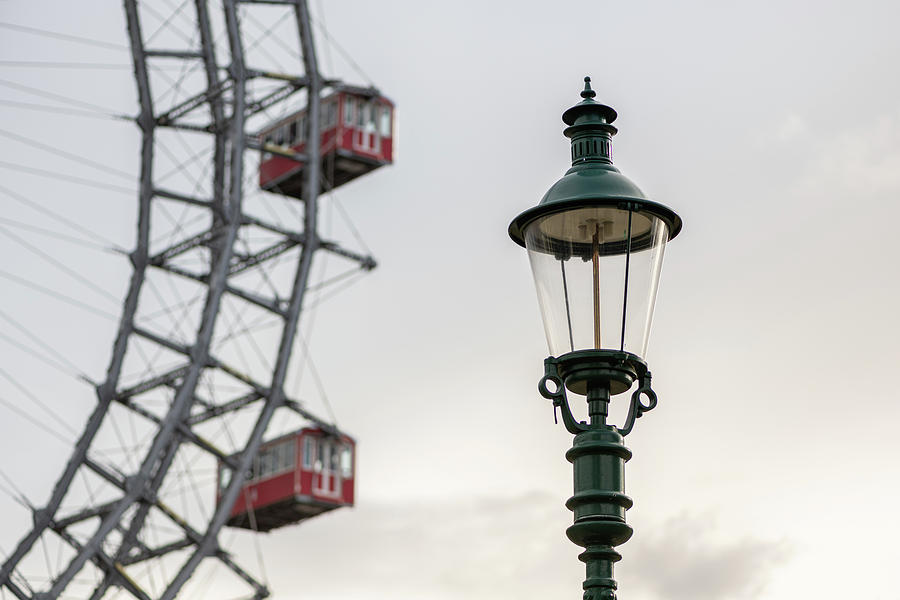 Lamp In Front Of Wiener Riesenrad On A Cloudy Day In Winter Photograph