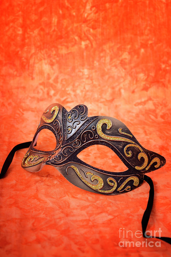 Mardi Gras mask on orange background.  #3 Photograph by Milleflore Images