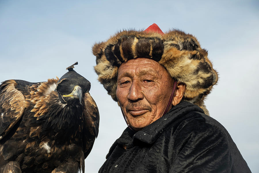 Mongolian Eagle Hunters Photograph By Andrew Chittock - Fine Art America