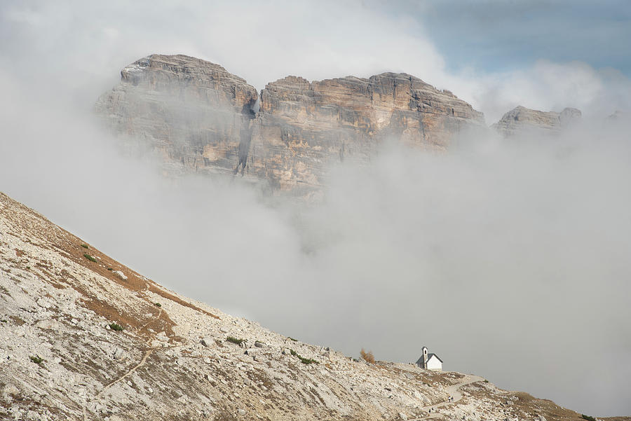 Mountain landscape with fog in autumn. Tre Cime dolomiti Italy. Photograph by Michalakis Ppalis