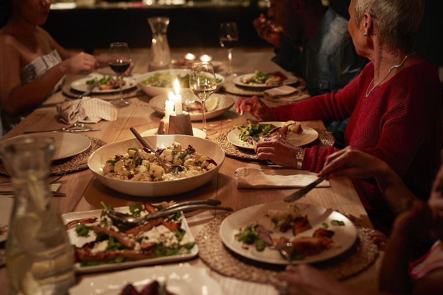 Multigenerational family having dinner #3 Photograph by Klaus Vedfelt