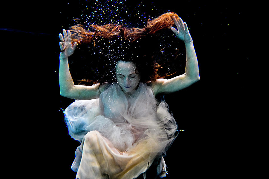 Nina floating in pool with dress Photograph by Dan Friend - Fine Art ...