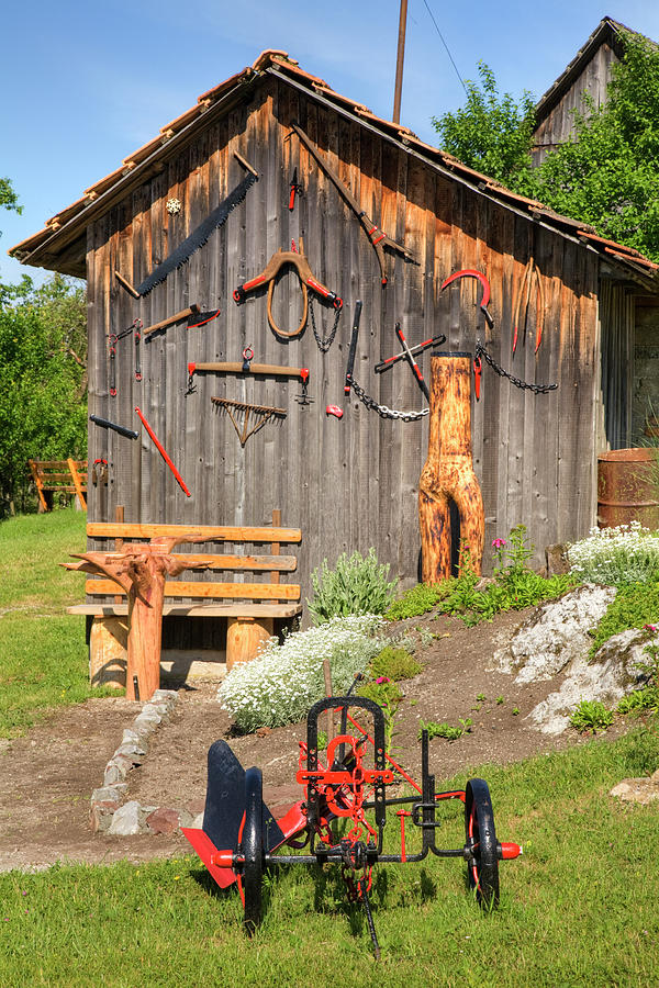 Old farm machinery in Nova Vas, Slovenia #3 Photograph by Ian Middleton
