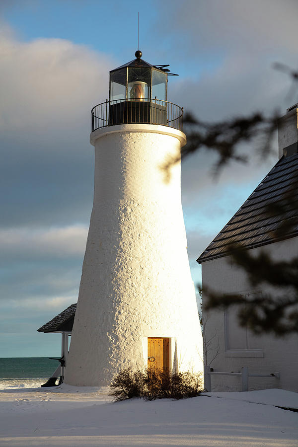 Old Presque Isle Lighthouse in Michigan along Lake Huron in the winter #3 Photograph by Eldon McGraw