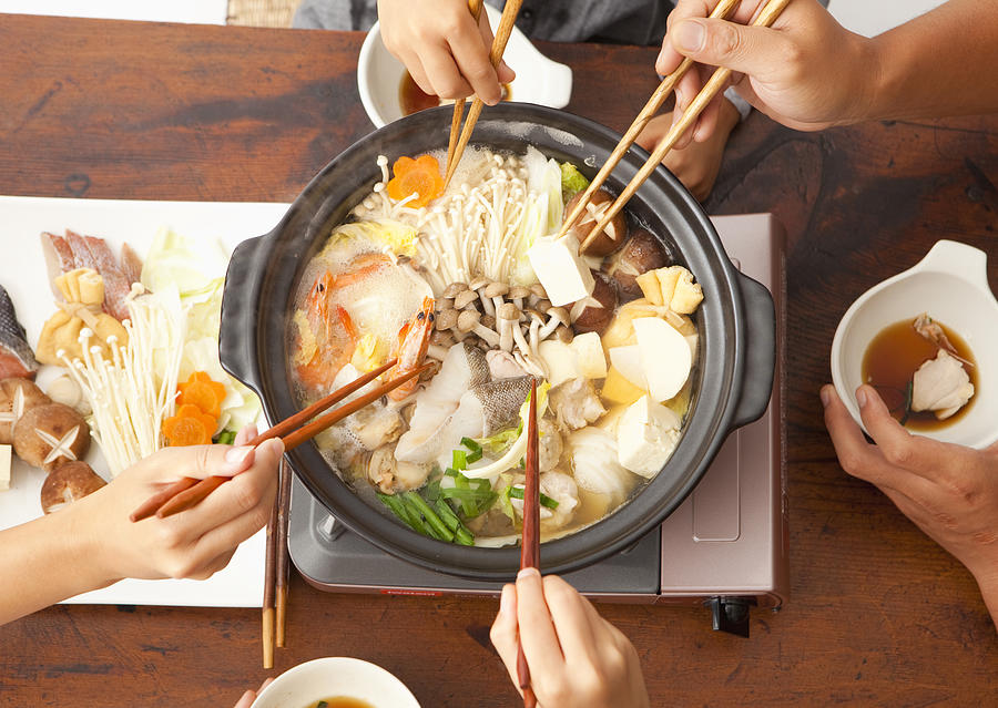Parents and children eating Japanese nabe #3 Photograph by Imagenavi