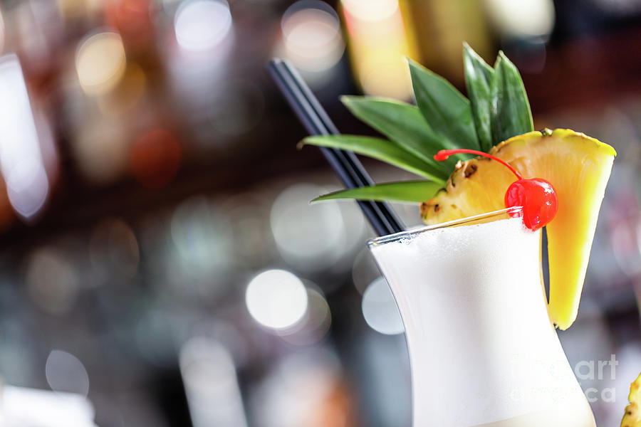 Pina colada coctail on bar counter #3 Photograph by Michal Bednarek