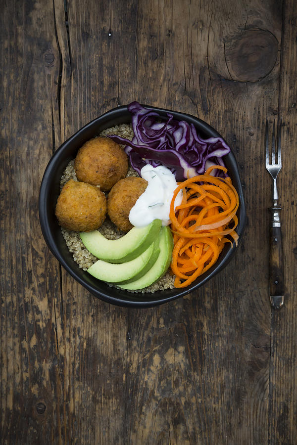 Quinoa lunch bowl with sweet potato falafel, carrots, red cabbage, avocado and yoghurt sauce #3 Photograph by Larissa Veronesi