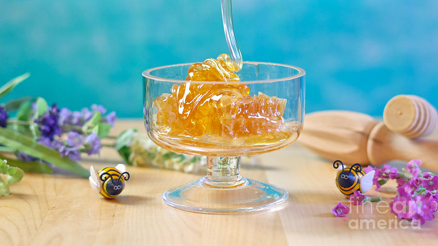 Nature Photograph - Raw honeycomb with liquid honey in glass jar with lavendar. #3 by Milleflore Images