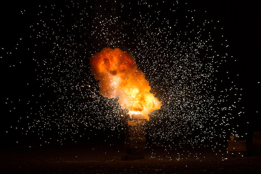Realistic fiery explosion busting over a black background #3 Photograph by Michalz86