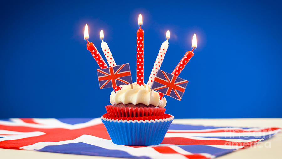 Red white and blue theme cupcakes and cake stand with UK Union Jack flags #3 Photograph by Milleflore Images