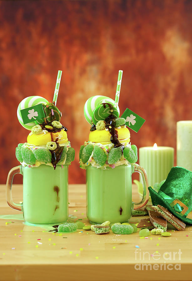 St Patricks Day on-trend holiday freak shakes with candy and lollipops. #3 Photograph by Milleflore Images