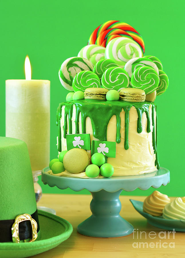 St Patricks Day theme lollipop candy land drip cake. #3 Photograph by Milleflore Images