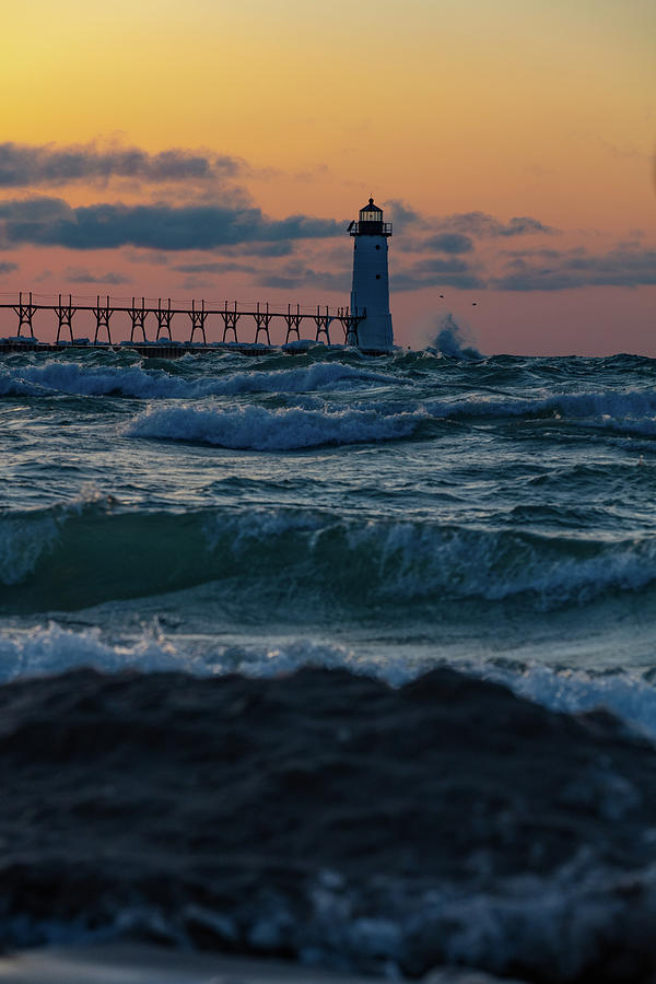Sunset at Manistee Pier and Lighthouse in Manistee Michigan during the winter #3 Photograph by Eldon McGraw